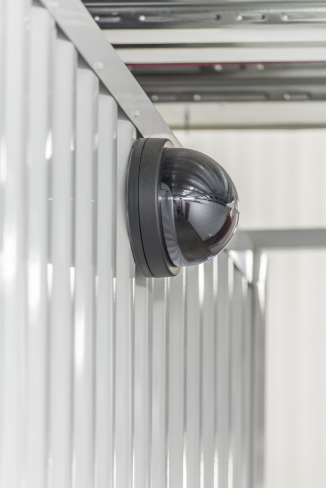 Security camera inside of a storage facility.